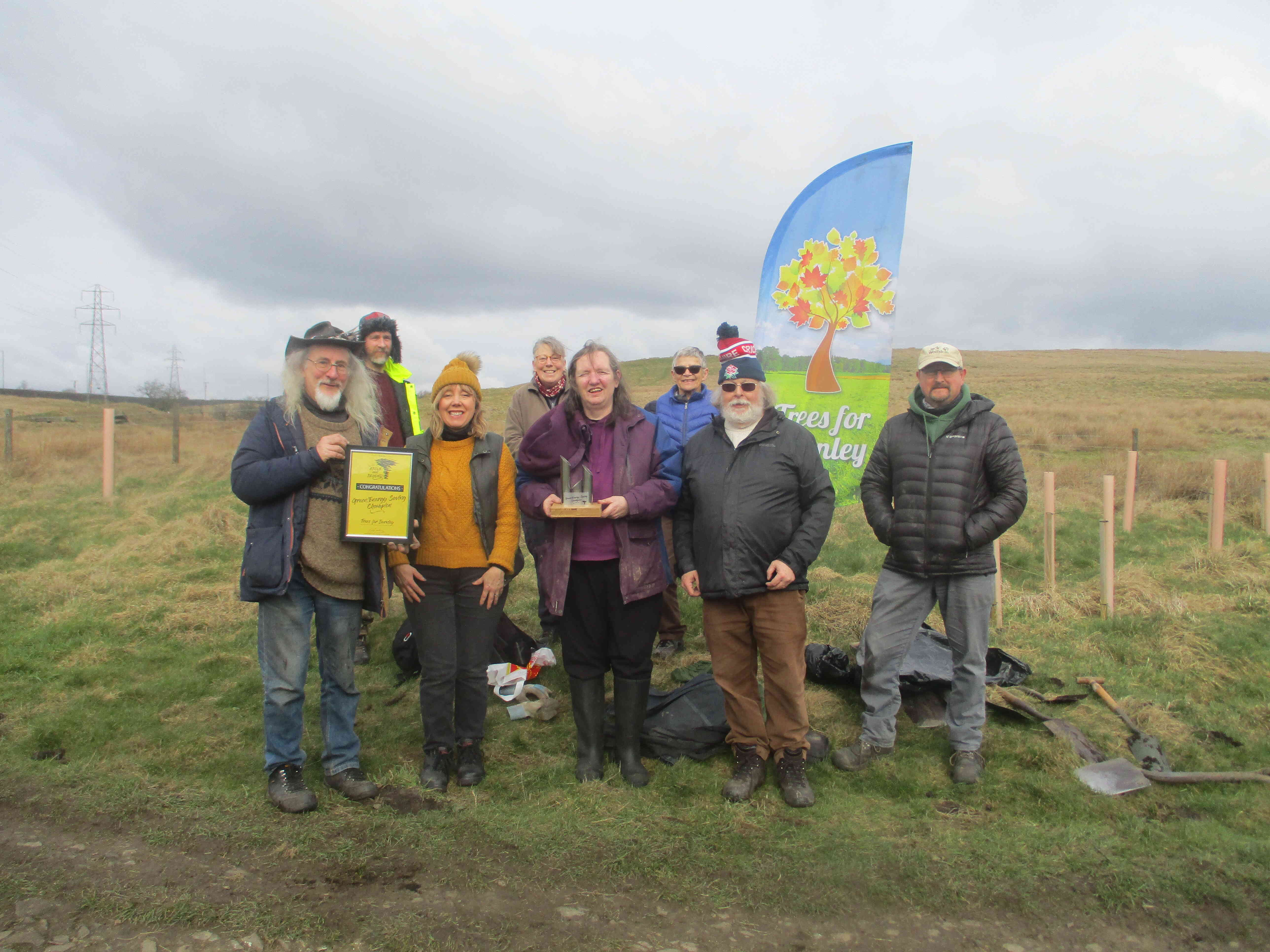 volunteers with Above & Beyond award